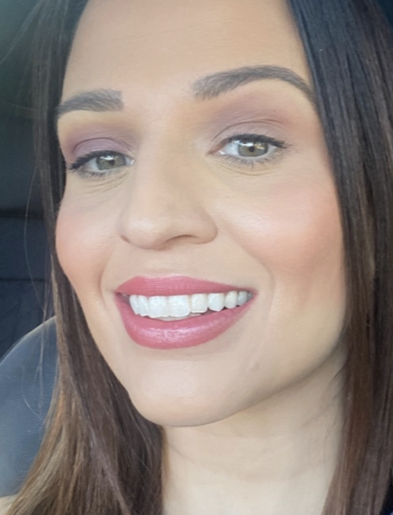 Selfie of a thoughtful woman reflecting, symbolizing personal growth, caregiving challenges, and quiet victories.