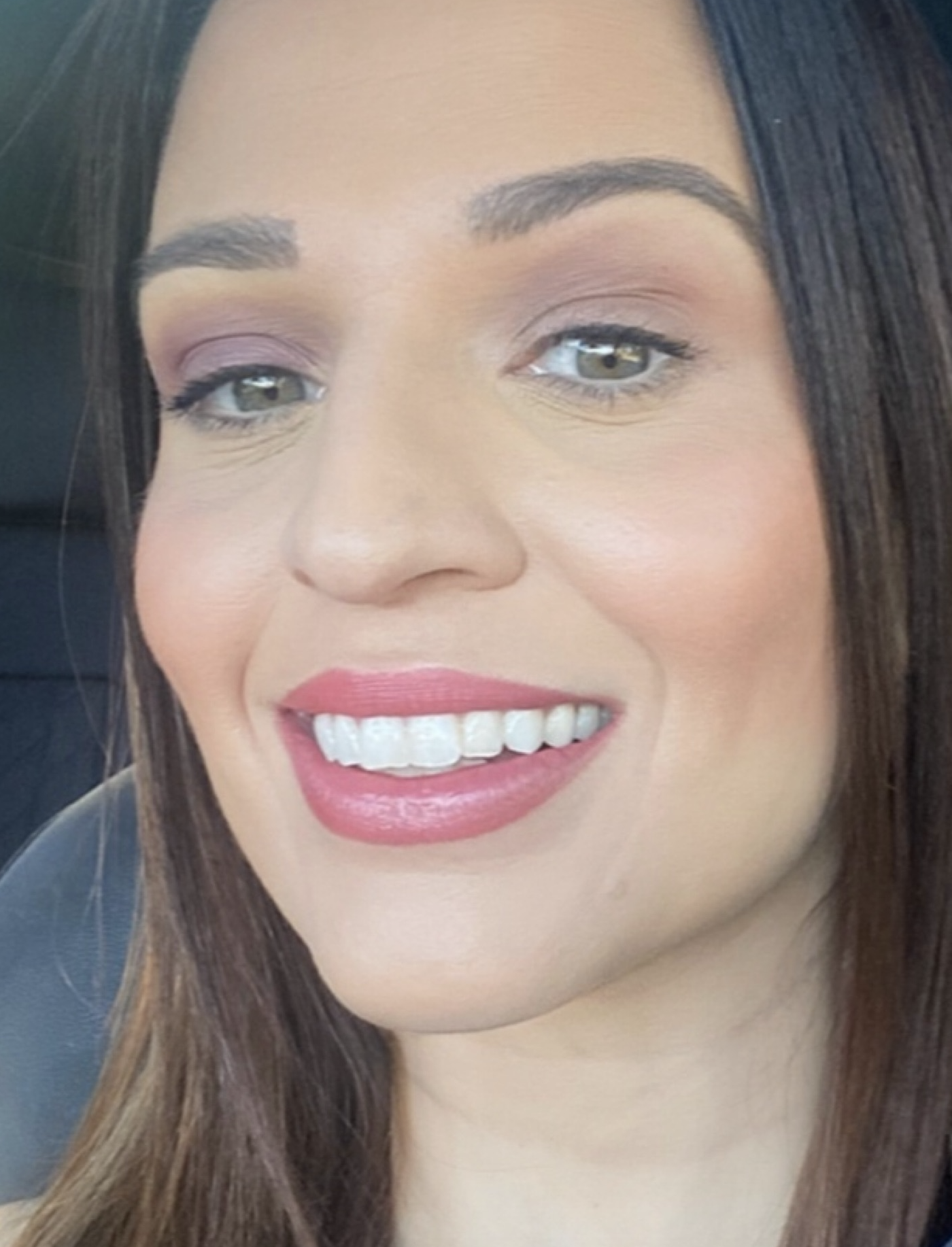 Selfie of a thoughtful woman reflecting, symbolizing personal growth, caregiving challenges, and quiet victories.